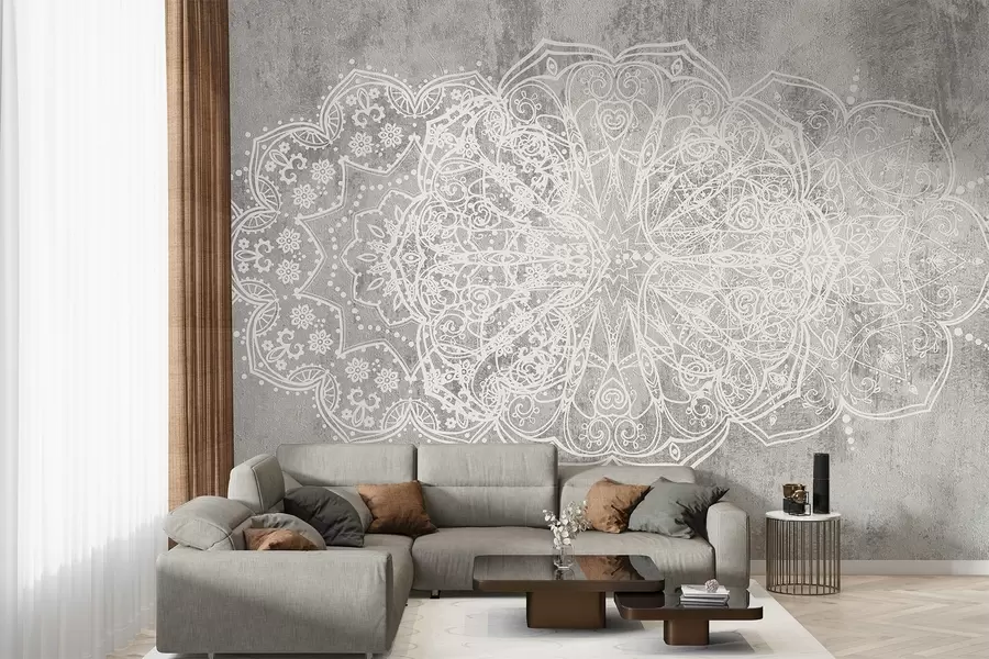 wall murals Детаљан, сложен узорак мандале од беле чипке на текстурираној позадини сивог зида у поткровљу w08387