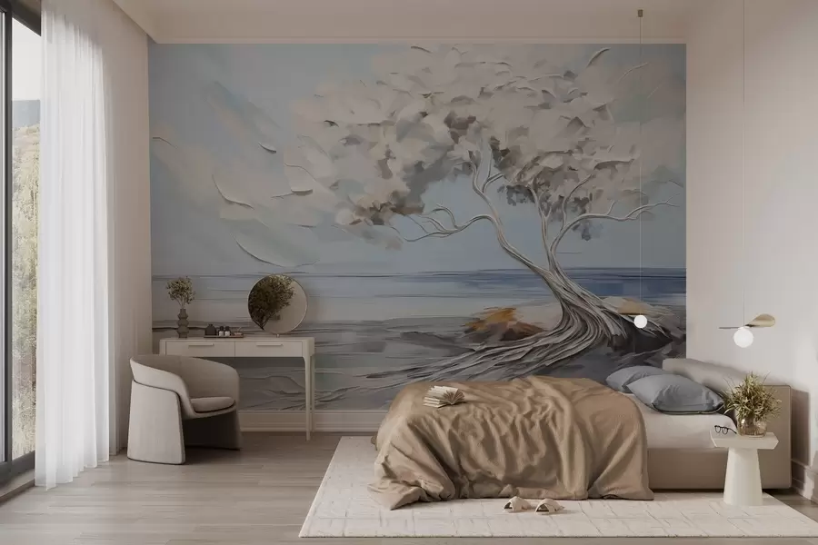 wall murals Бело дрво са дебелим и текстурираним листовима на пешчаној плажи, пејзаж са светлоплавим небом w09205